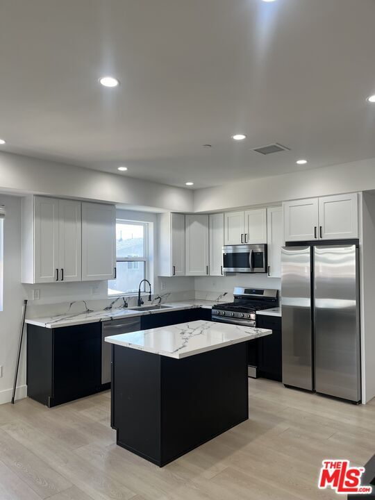 Building Photo - 212 E 29th St Unit 214 1/2