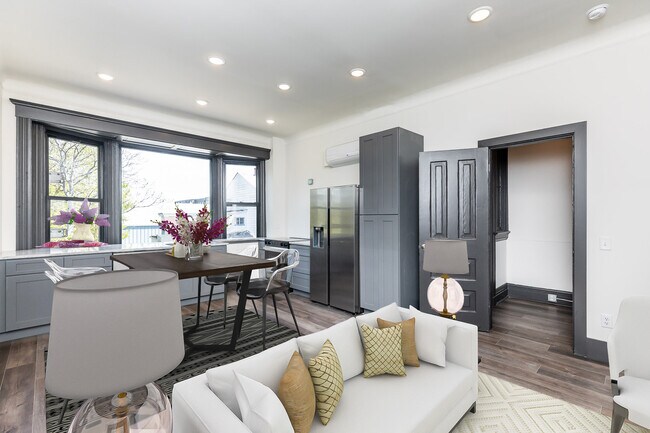 Kitchen with high end appliances and huge bay window. - 728 E McMillan St Unit 4