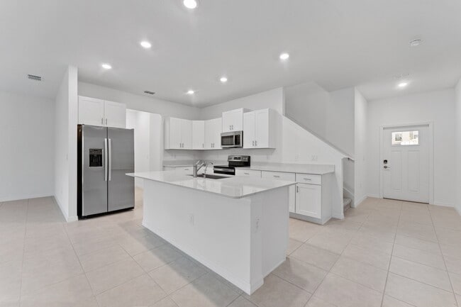 Photo - Absolutely stunning 3 BR /2.5 Bath / 2 Car Garage + LOFT townhome in ultra-modern and green-focus...