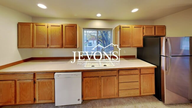 Photo - Two-bedroom home with a fully equipped kit...