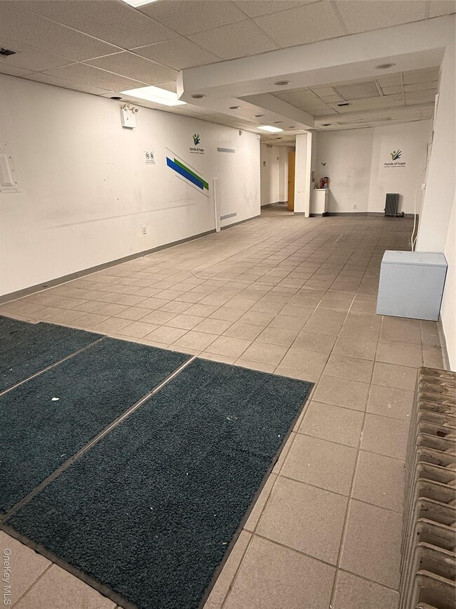 Photo - 86-20 Jamaica Ave Unidad Storefront