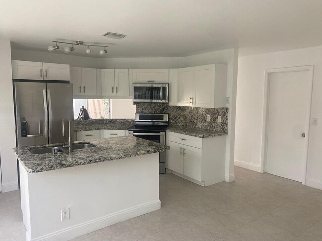 Photo - Northwest 107th Way, Sunrise, FL 33351 - 3...