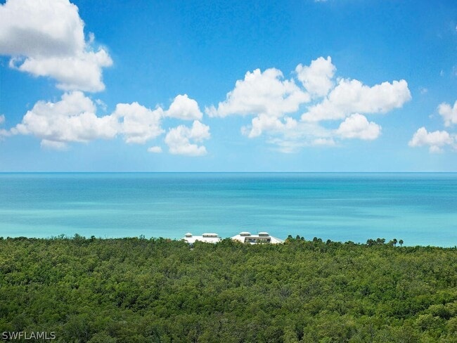 Building Photo - 7225 Pelican Bay Blvd Unit 2102