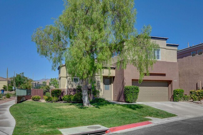 Photo - Situated on a beautifully landscaped oversized corner lot within the gated community of Desert Bl...
