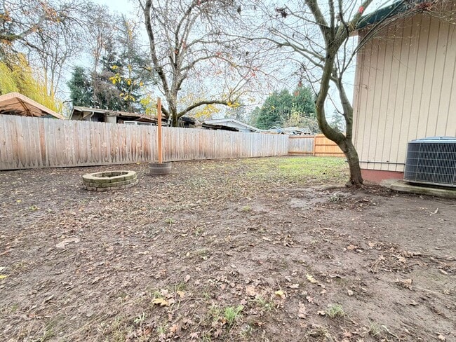 Photo - Comfortable Beaverton Home with AC, Fireplace, Large Fenced Yard, Spacious Garage and W/D!