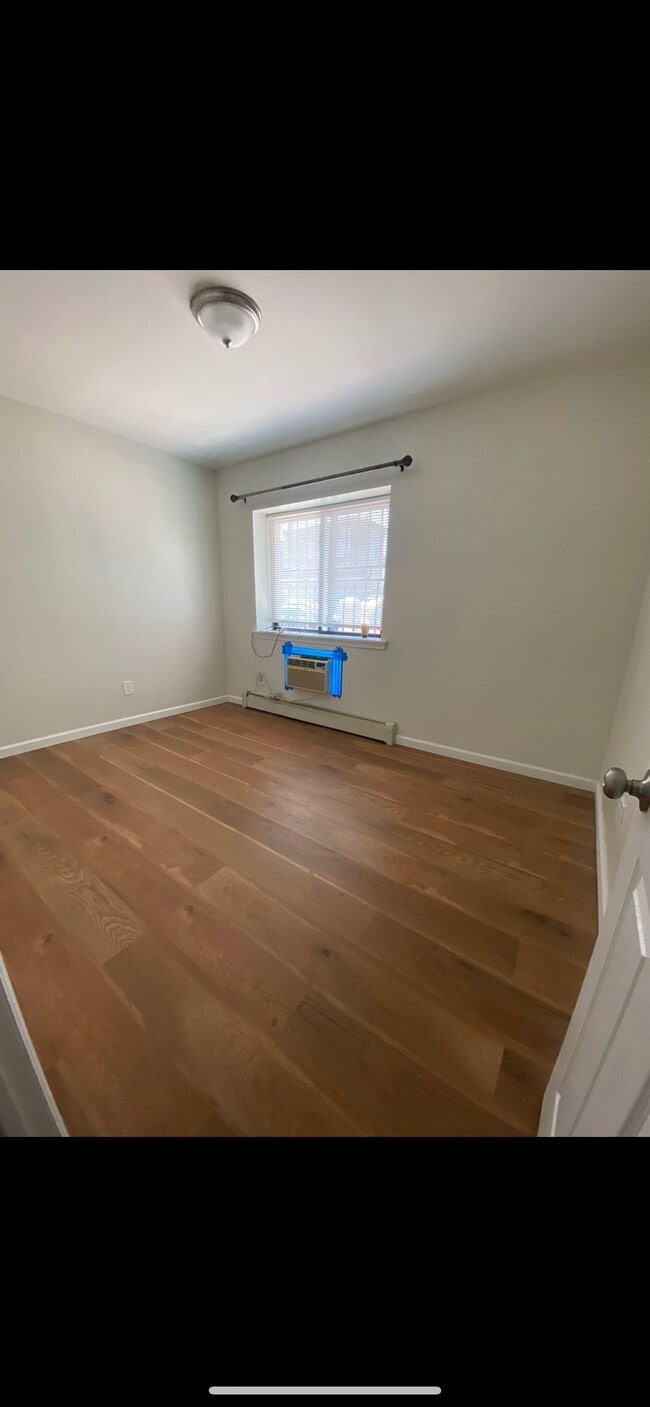 Photo - 73-26 Queens Midtown Expy Unit 1FL