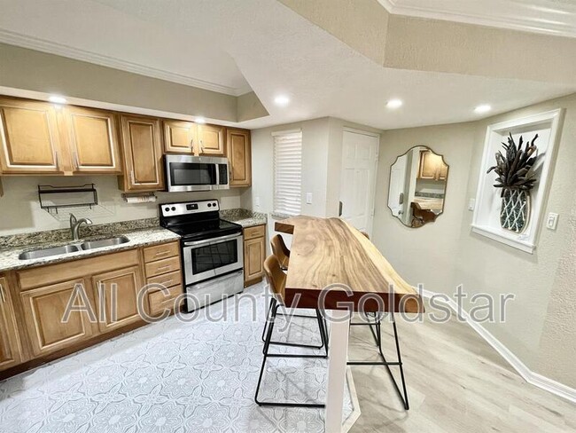 Building Photo - 19505 Quesada Ave Unit VV102