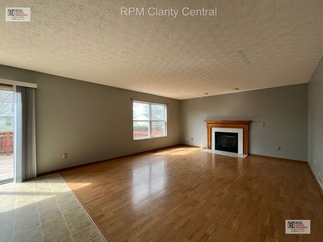 Photo - Spacious 4-Bedroom Home with Fenced Backyard, Deck, and 2-Car Garage