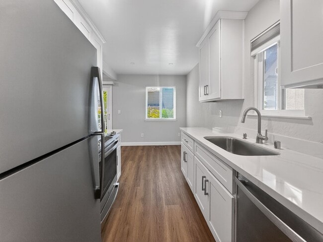 Photo - Gorgeous and Completely Remodeled Lower Level Unit with Inside Laundry is Available Now! Unit 9