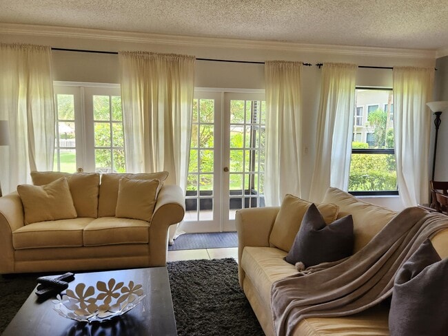 Building Photo - 11863 Wimbledon Cir Unit 402 Rental