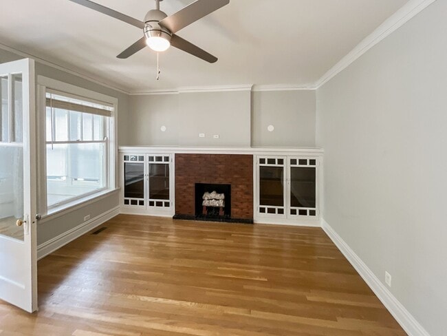 Building Photo - 5943 N Magnolia Ave Unit 1