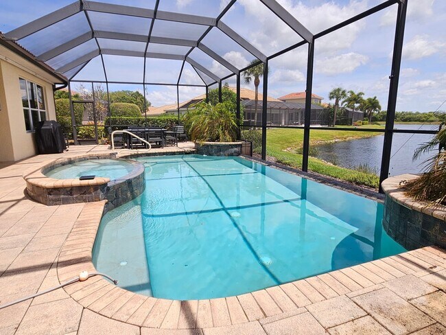 Photo - Seasonal Short-Term 4 Bedroom 3 Bathroom Heated Pool Home located in Venetian Golf & River Club!