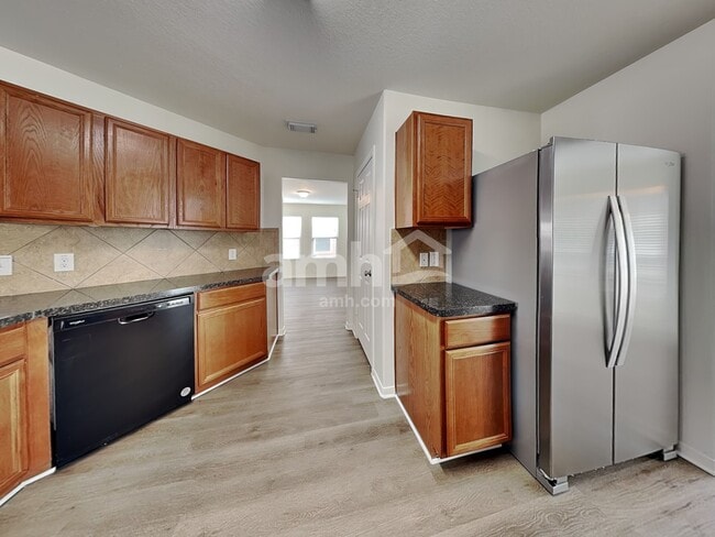 Photo - 16843 Blackberry Lily Ln