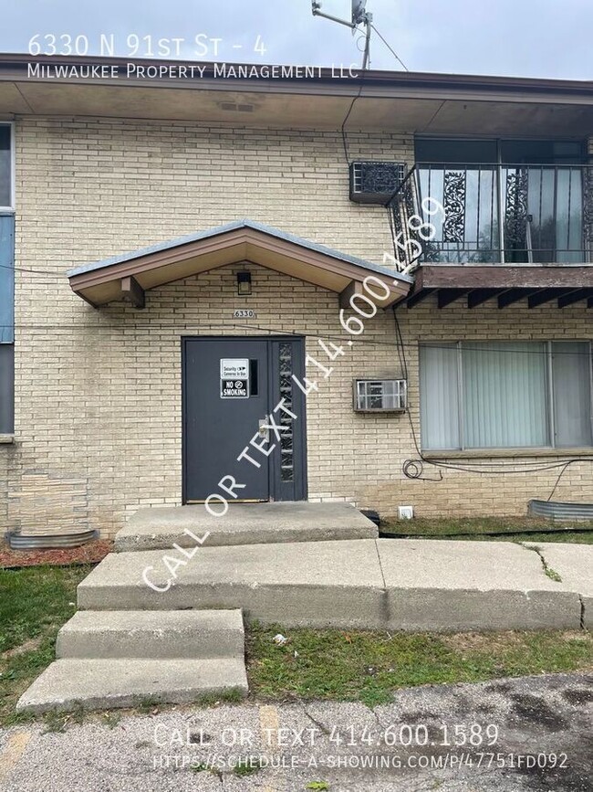 Building Photo - 6320-6330 N 91st St Unit 4