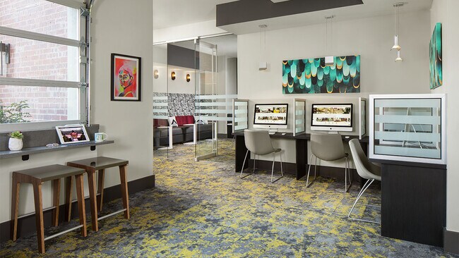 Apartment community business center with MAC work stations at Griffis North Union in Denver, Colorado.