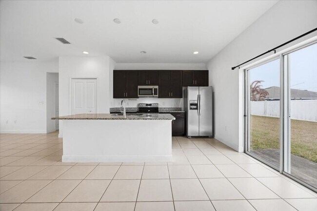 Photo - Stunning 4-Bedroom, 2-Bath Home in Poinciana with Modern Upgrades