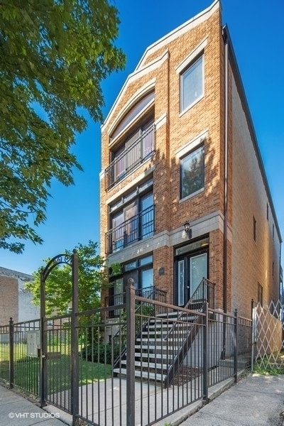 Building Photo - 6332 S Ellis Ave Unit 3