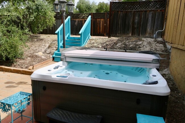 Photo - Garcia House: Fully Furnished, Wonderful Hot Tub, Spacious Fenced Outdoor Area, Pet-Friendly too!
