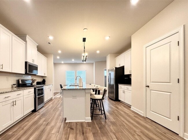 Photo - Enchanting 3-Story Single Home  | 4 BR/3.5BA | 2-Car Garage |In City Park Community!