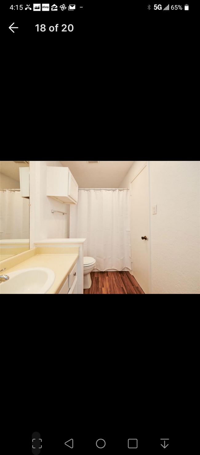 Beautiful wood floor in the bathroom. Warm for your feet in the morning. - 12400 Overbrook Ln Unit 12200 Overbrook Ln 38D