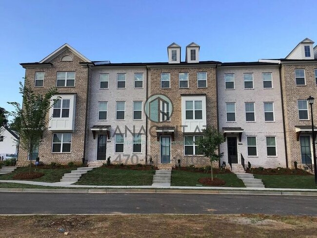 Building Photo - Elegant 3 Bedroom Townhome in a gated comm...