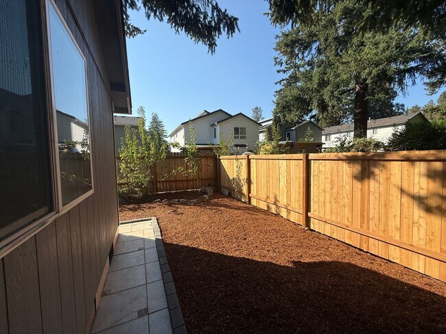 Photo - Spacious 3BD/2BA Home with Two-Car Garage,...