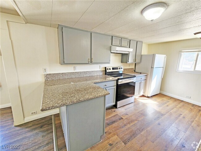 Building Photo - 1080 W Windsong Ln Unit B Rental