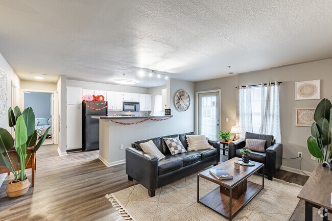 4BR, 2BA - 1,076SF - Living Room - The Ridge