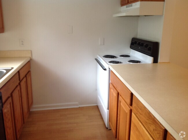 One Bedroom Kitchen - Village in the Park Apartments