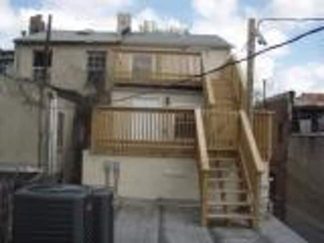 Building Photo - 1209 Hollins St Unit 1