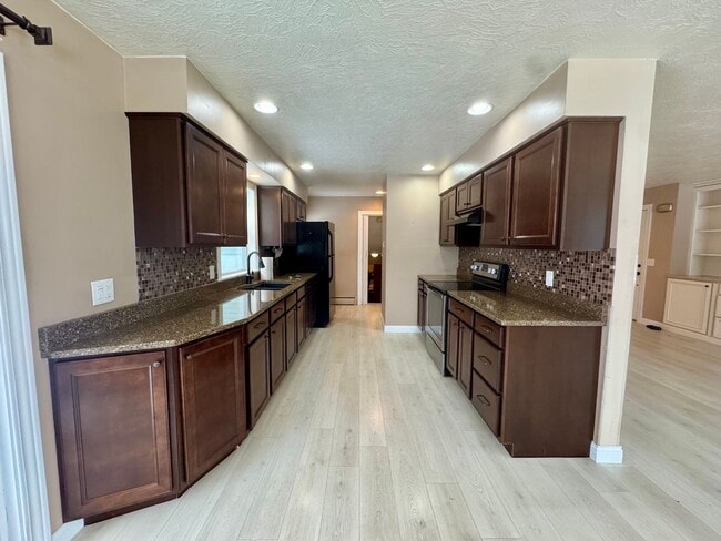 Photo - Under Renovation Now — Reserve This 4 Bed Home for January Move-In