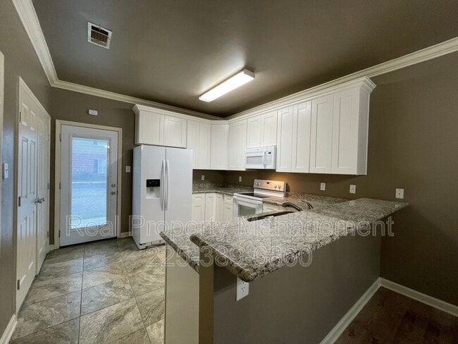 Building Photo - 31855 LA-16 Unit 1002