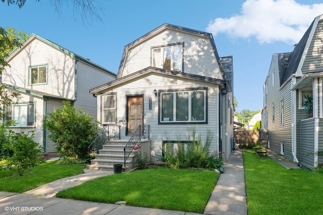Building Photo - 5639 N Karlov Ave Unit 2FL