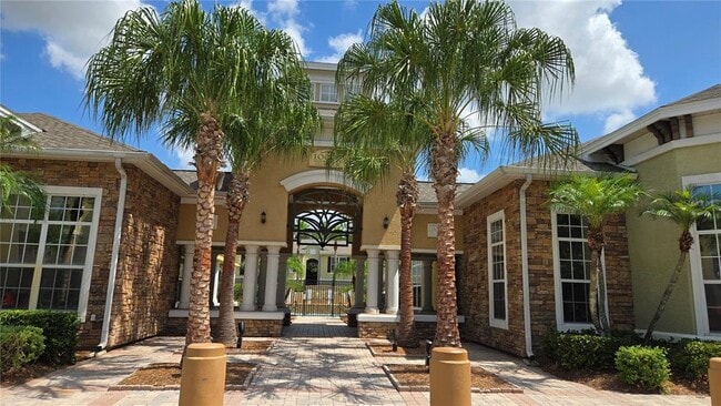 Building Photo - 10021 Courtney Palms Blvd Unit 303