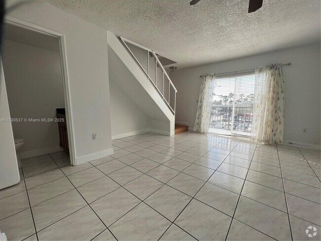 Building Photo - 5731 NW 37th St Unit 305 Rental