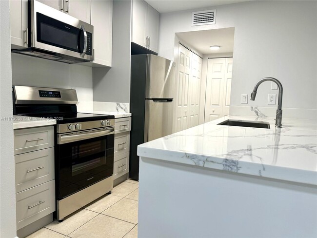 Building Photo - 15770 SW 106th Terrace Unit 105 Rental