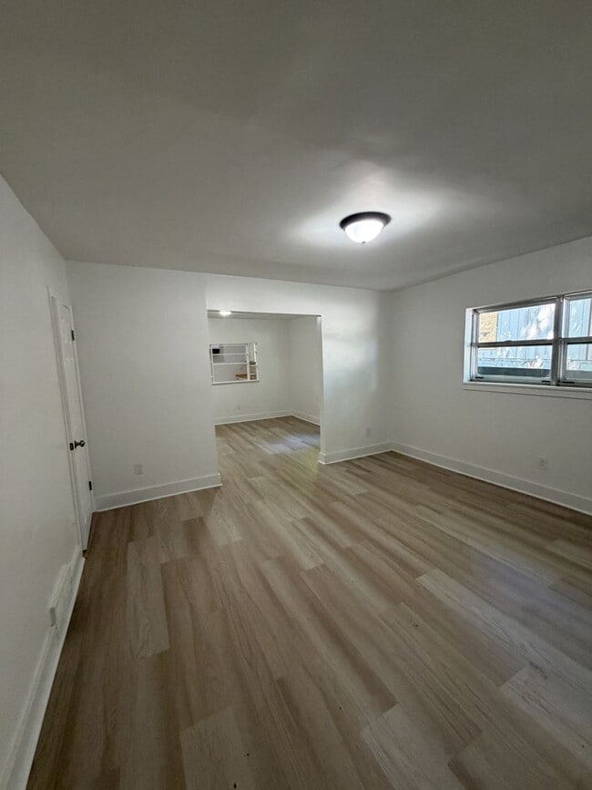 Photo - A spacious and inviting 4-bedroom, 2-bath unfurnished home