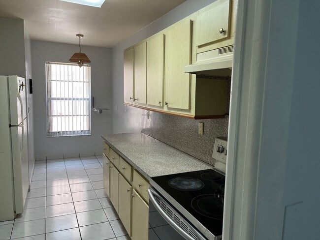 Building Photo - 7355 W 4th Ave Unit 213