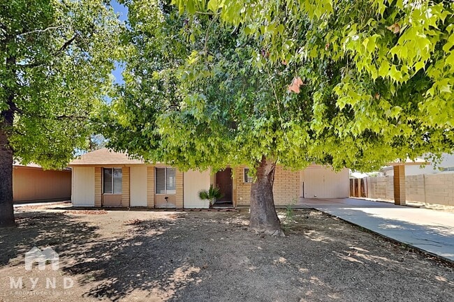 Building Photo - 7233 W San Miguel Ave