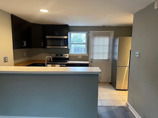 Photo - One level living in a spacious upgraded condo