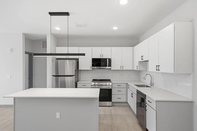 C1 Kitchen with Island - The Apartments at Plymouth Walk