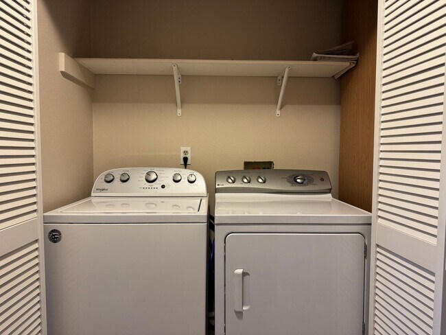 Photo - Serene Ground-Floor Condo Overlooking Green Space – Parking Included Unidad A-109