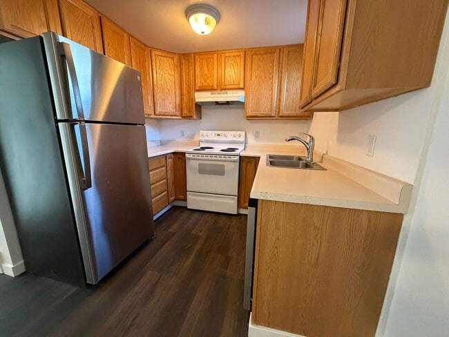 Building Photo - Viking Properties LLC - Duplex II Unit 1102 10th Avenue NW (lower)