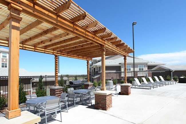 Pool and outdoor lounge area at Outlook Blvd.
