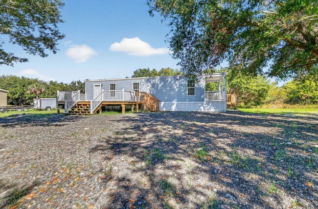 Photo - Brand-New Home on Canal to Lake Griffin – ...