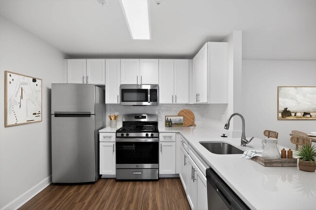 Welcome to Eagle Rock Apartments at Columbia Pike, where modern kitchens blend elegance and functionality. Enjoy premium appliances and an inviting atmosphere designed for your comfort. Schedule a visit today to find your perfect home!