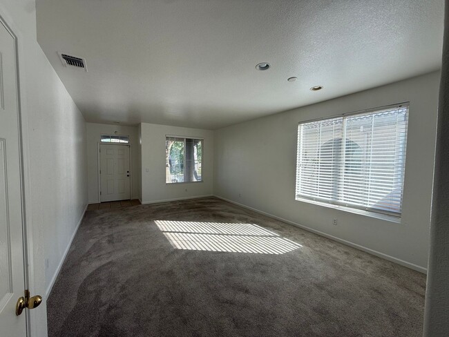 Photo - 4 Bed| 2 Bath | 1702 SF | 2 Car Garage | Single Story | Tenant pays $175 for WS&G.