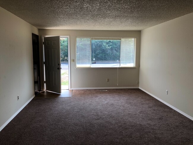 Photo - Clean & Move-In Ready 2-Bedroom Home with Garage and Large Fenced Yard