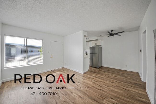 Building Photo - 12520 Lakewood Blvd Unit 57