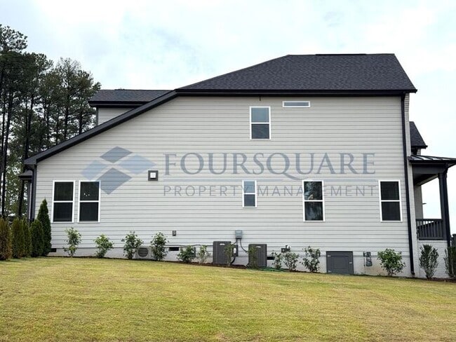 Photo - Elegant 4-Bed / 3.5-Bath Home with Main-Level Primary Suite, Quartz Kitchen & 3-Car Garage – In H...